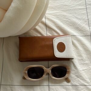 Crap pink sunglasses — “bikini vision”